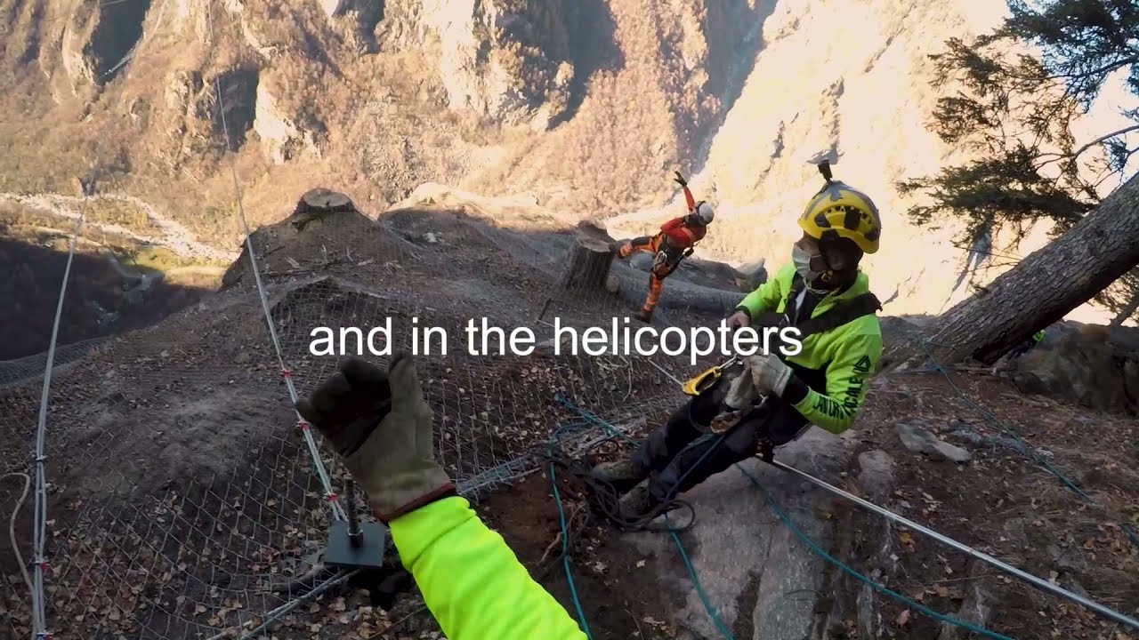 Giant rockfall drape gets installed with Kamov helicopter