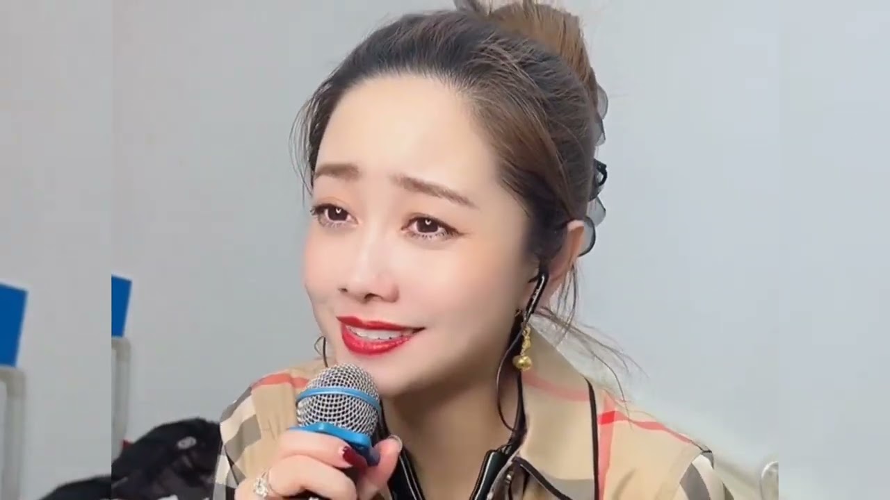一首《我的情深你若懂》旋律优美，歌声醉人，情意绵绵，深情伤感  街头女孩唱