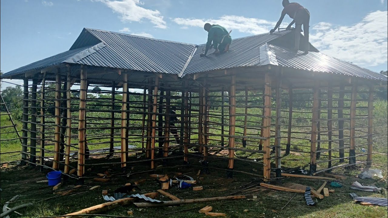 We built a 100k semi permanent house in the village!! House under construction