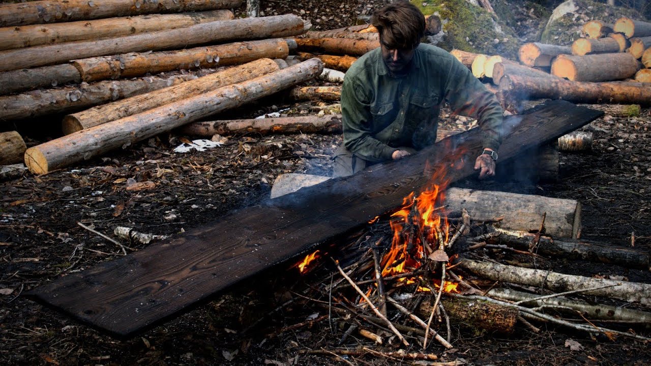 Ancient Wood Preserving Technique For Log Cabin
