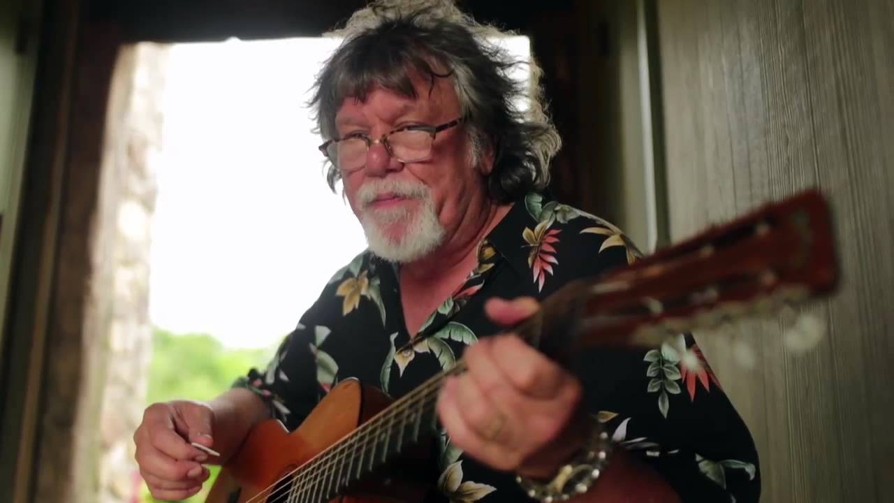 The Radiators' Dave Malone shows off his wife's only guitar