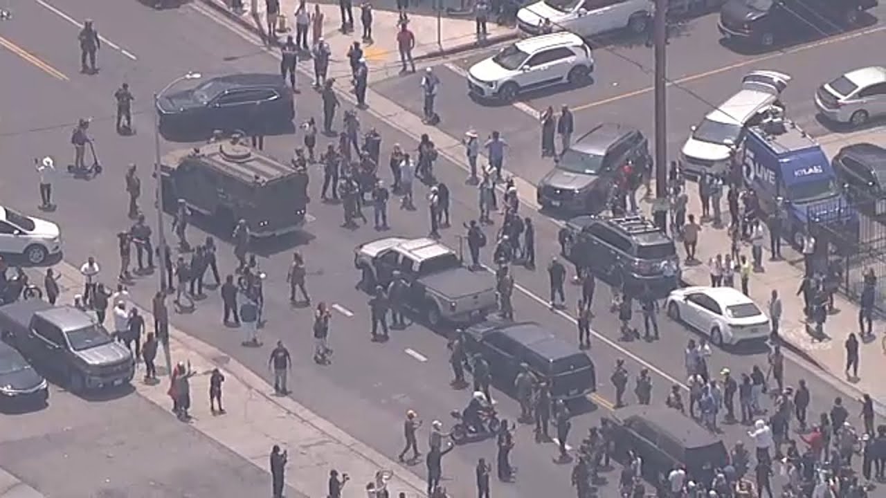 ICE agents confronted as tensions flare up following raids across Los Angeles