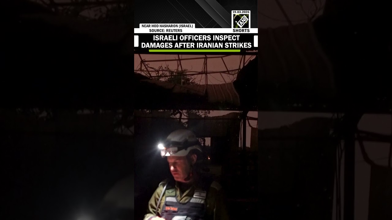 Israeli officers inspect damages from overnight Iranian strike in central Israel