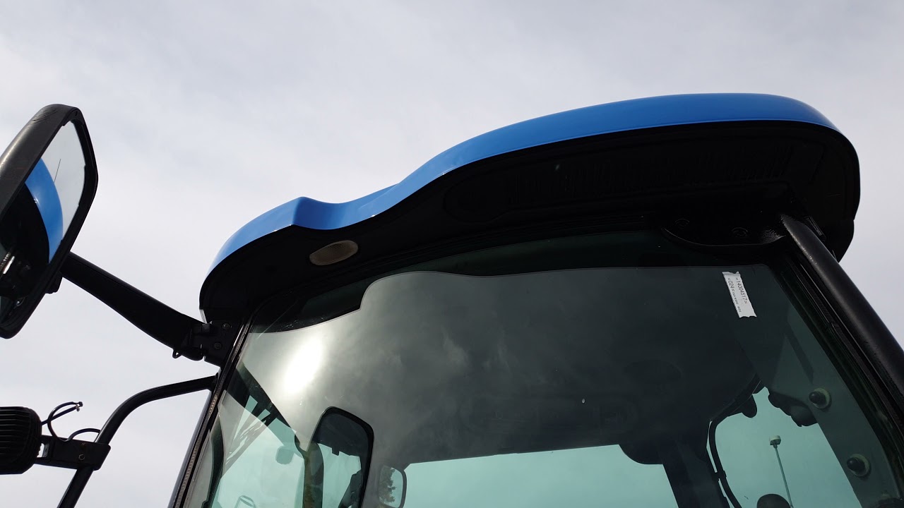 New Holland TS110 a