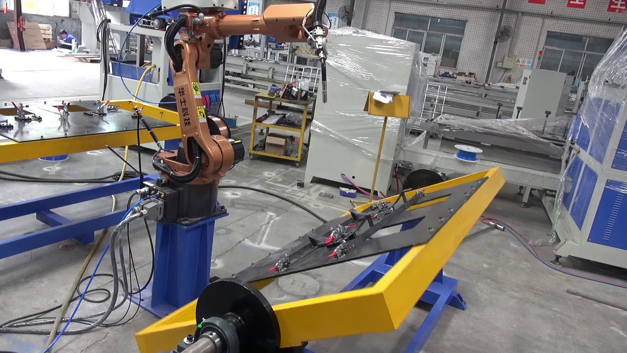 Welding robot positioner motion tables