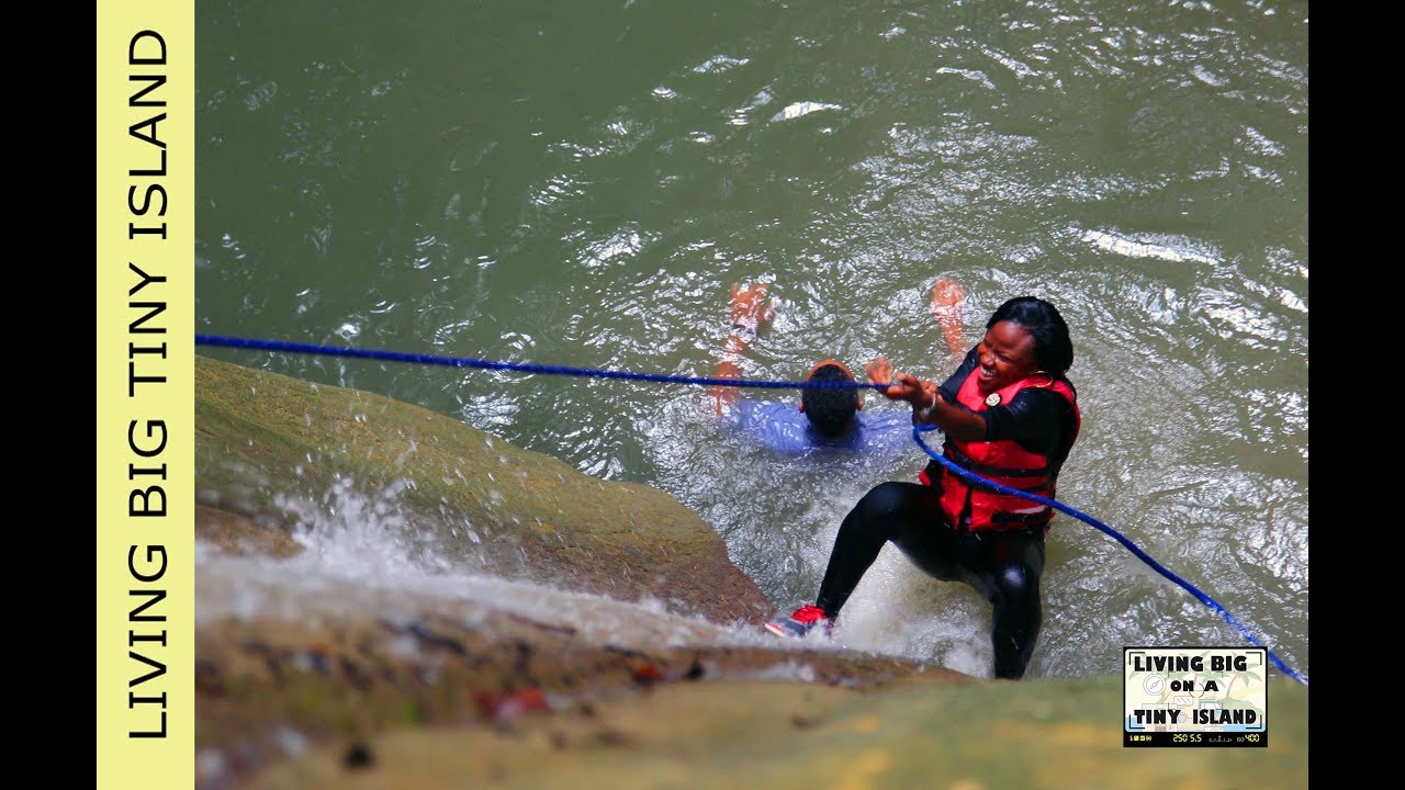 Hikers plunge down Turure Water Steps while rappeling