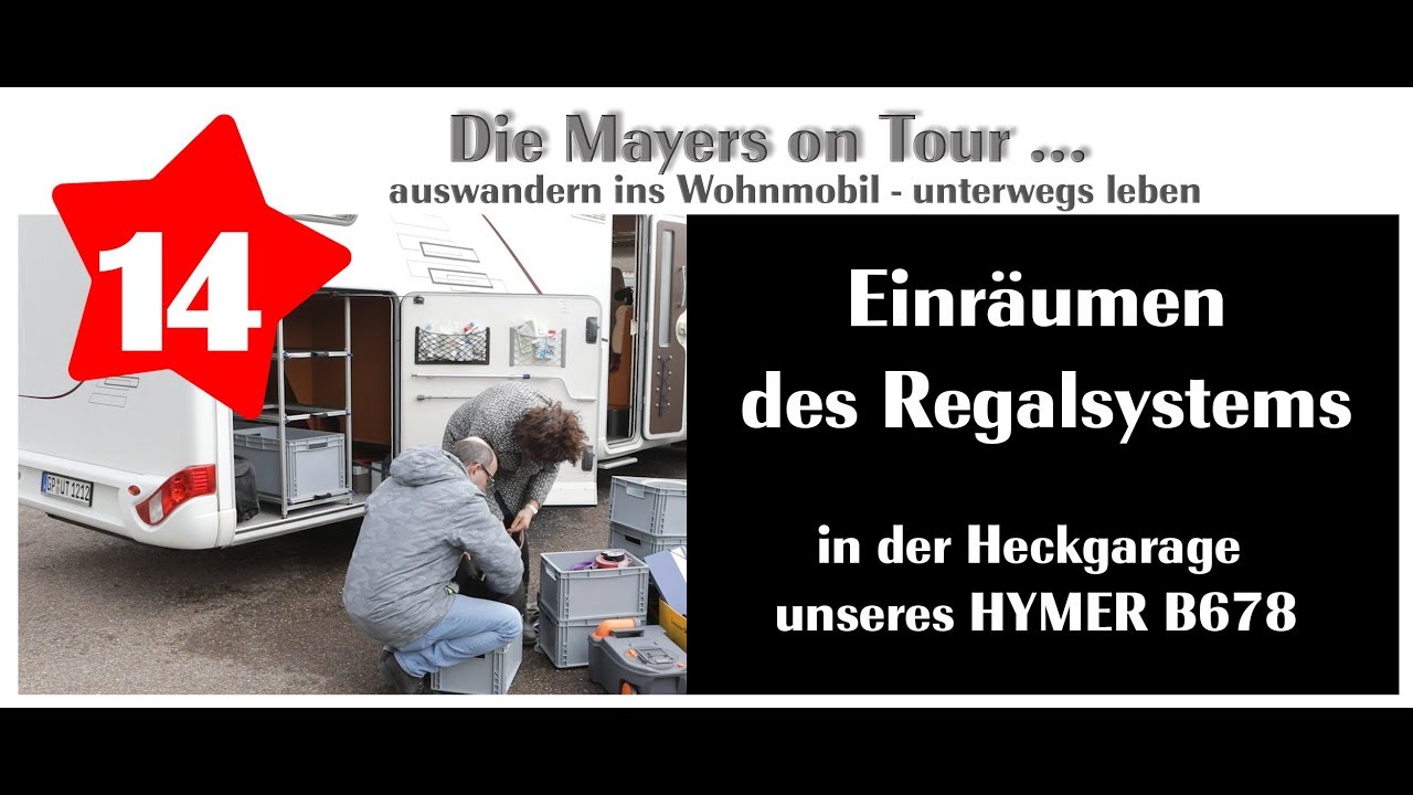 Einr&auml;umen des Regalsystems in der Heckgarage unseres Hymer B678
