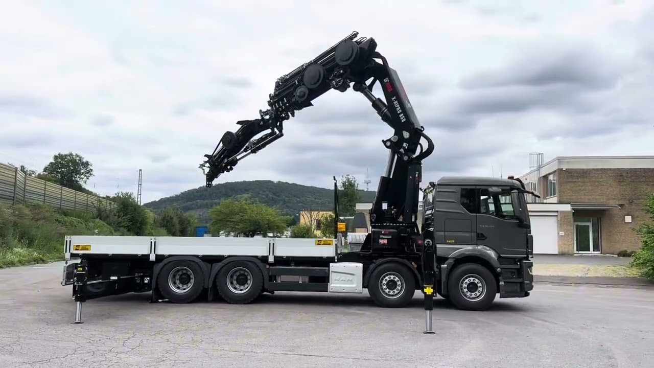 MAN TGS 35.520 BL 8x4 Hiab 858-8 plus Jib Aufbau HD Truck Solutions