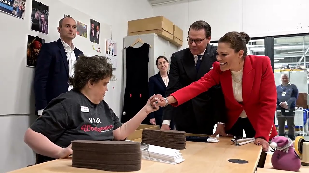 Crown Princess Victoria stepping in and helps factory worker