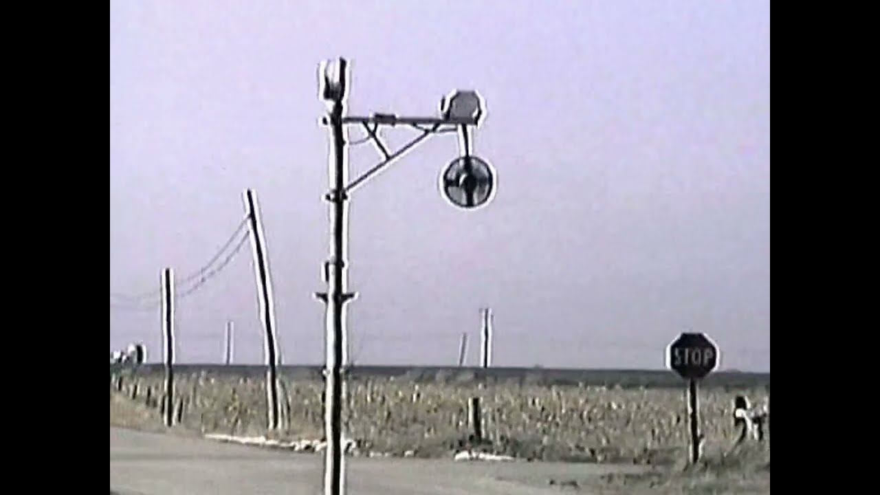 RARE Wig Wag train crossing in action with Chicago Central & Pacific freight