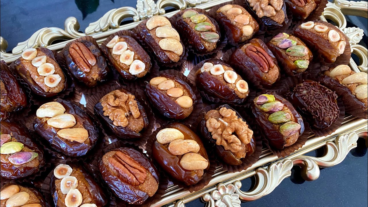خليهم مذهولين بمذاقه المميز،تمر معمر بحشوة لذيذة بزاف لكل مناسباتكم،رووووعة