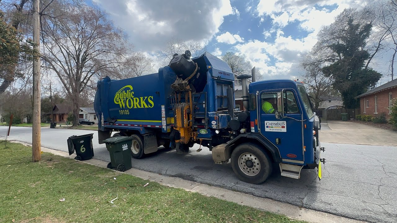 Columbus Georgia peterbuilt new way garbage trucks lid flipping black and white Trash cans