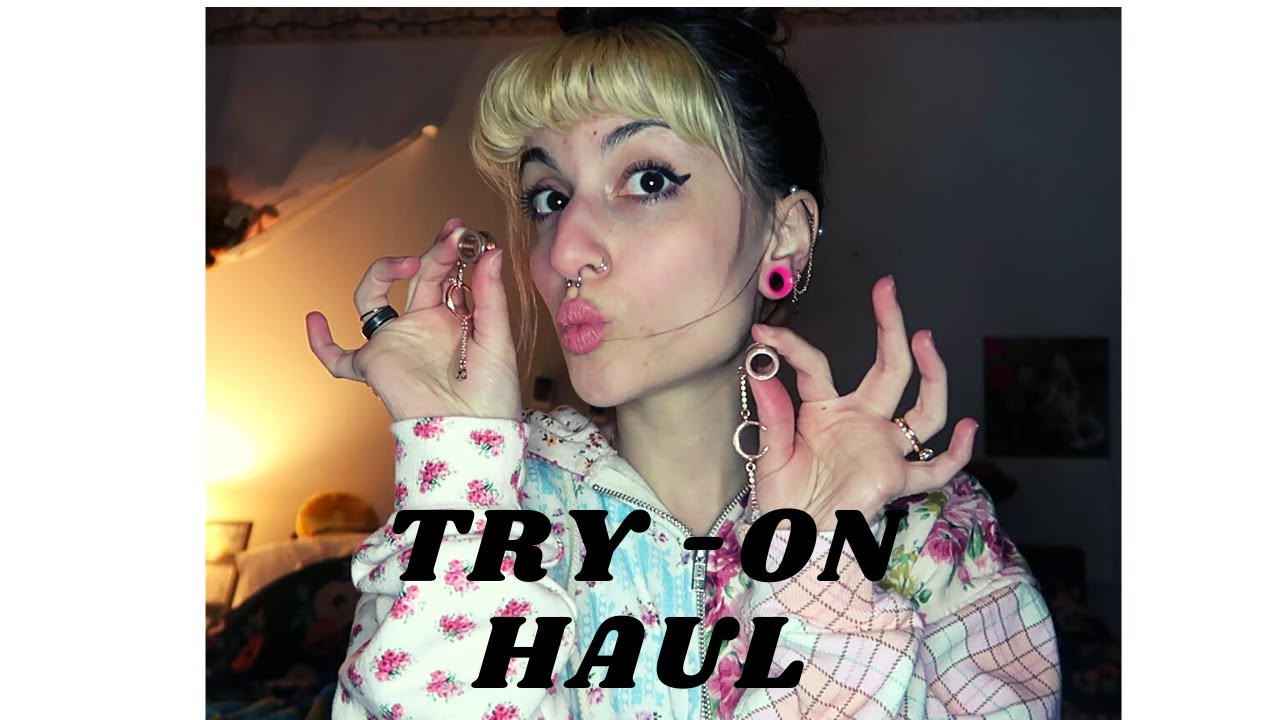 I stretched my ears...again. (12mm tunnel try-on)
