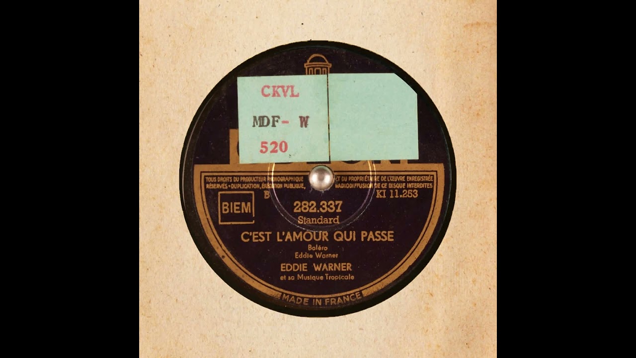 C'EST L'AMOUR QUI PASSE   EDDIE WARNER et sa Musique Tropicale
