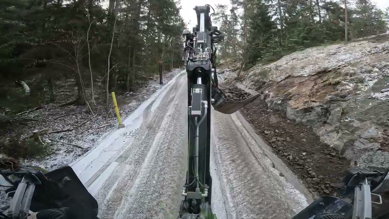 Huddig 1260 Backhoe ditching