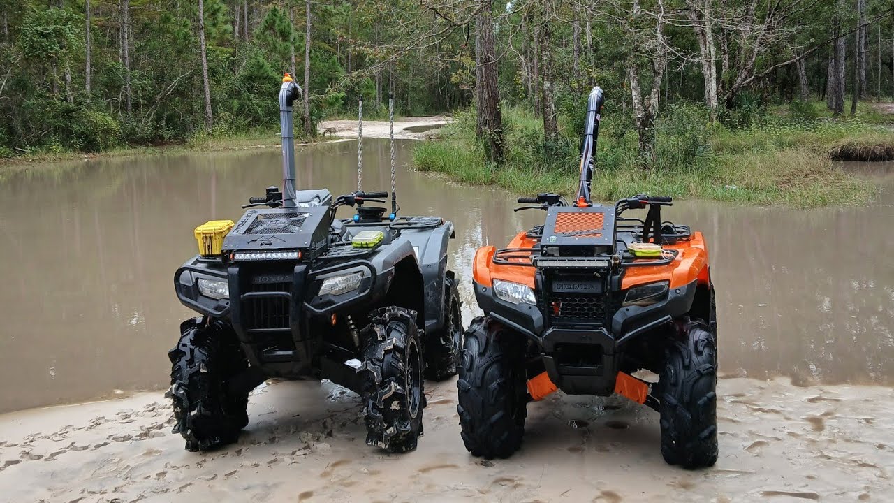 Honda rancher 420 going deep on floaty tires