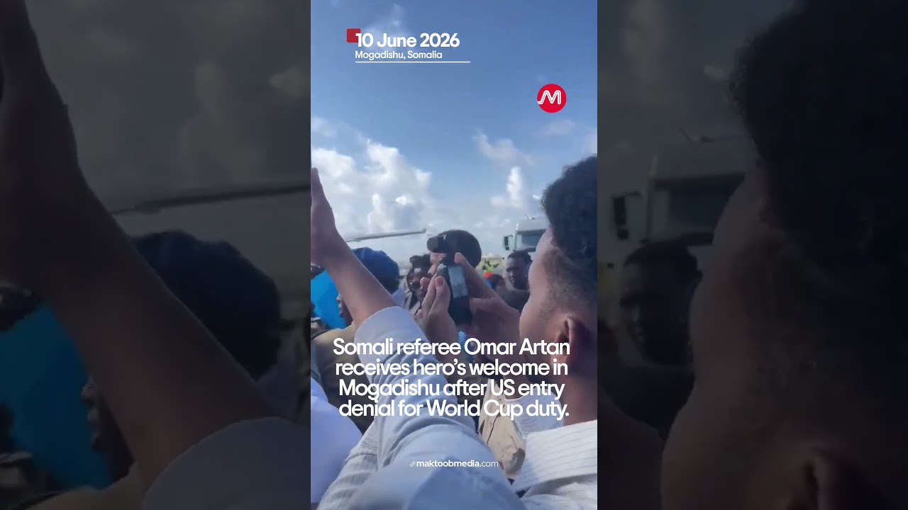 Somali referee Omar Artan receives welcome in Mogadishu after US entry denial for World Cup duty.