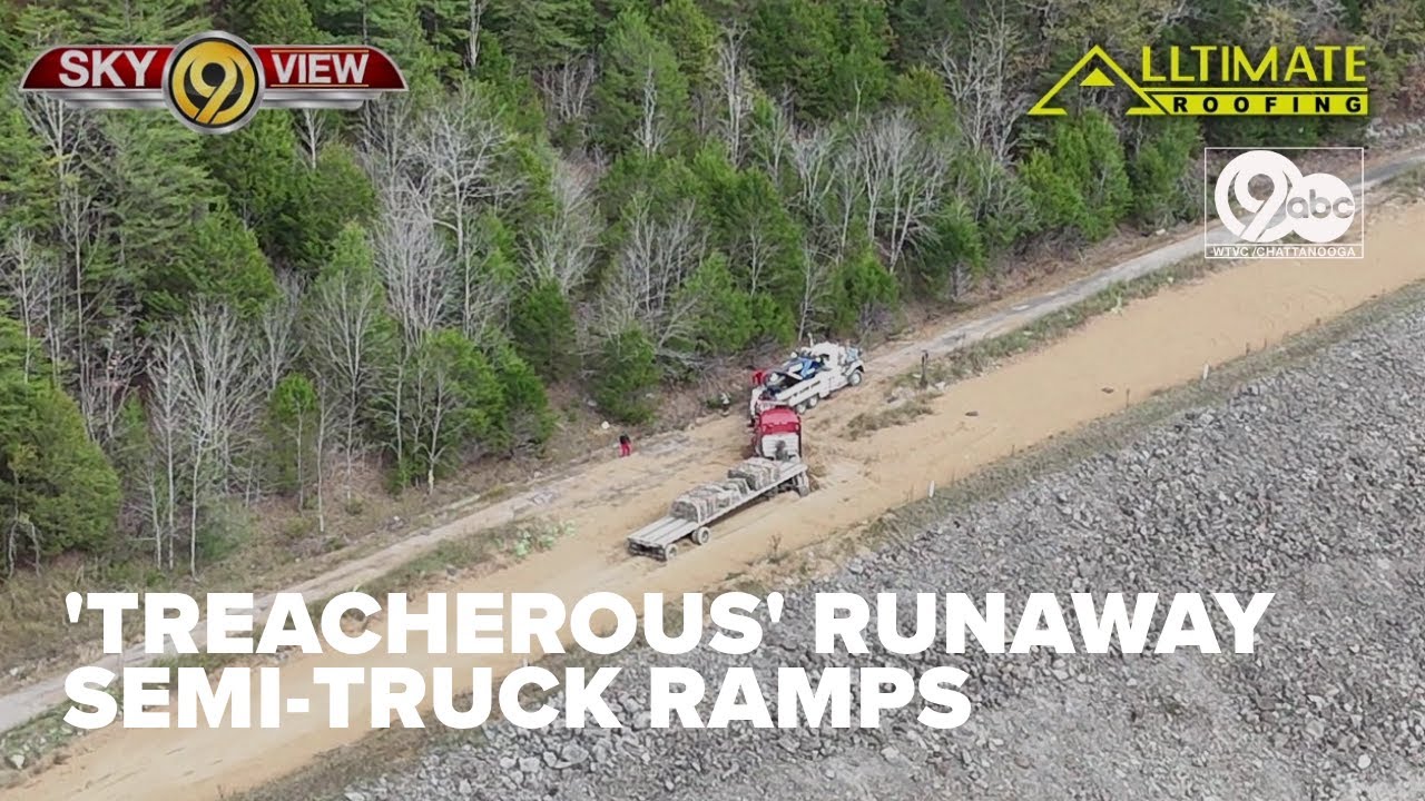 Why are I-24's runaway truck ramps on Monteagle Mountain on the left side of the road?