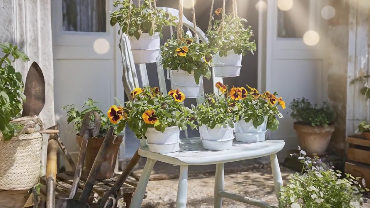 A Rustic Farmhouse Backyard Garden Filled with Artistic Upcycled Inspirations
