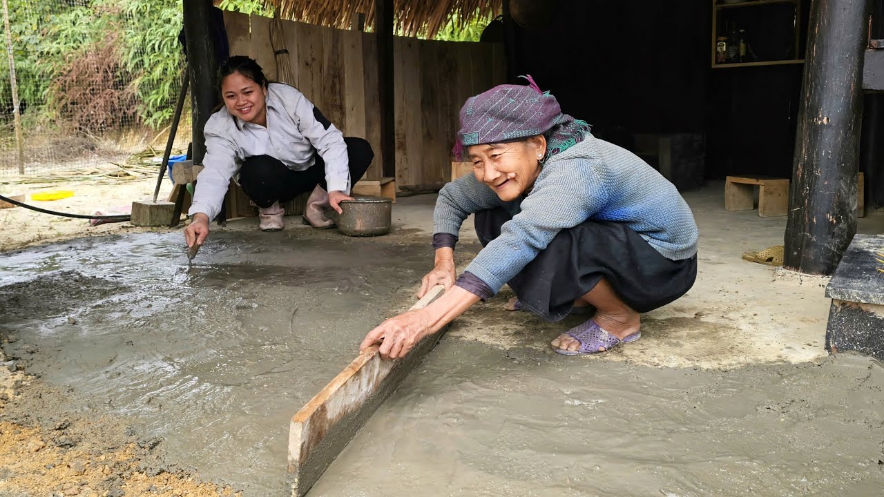 The homeless girl and the old woman are determined to finish tiling the kitchen floor.
