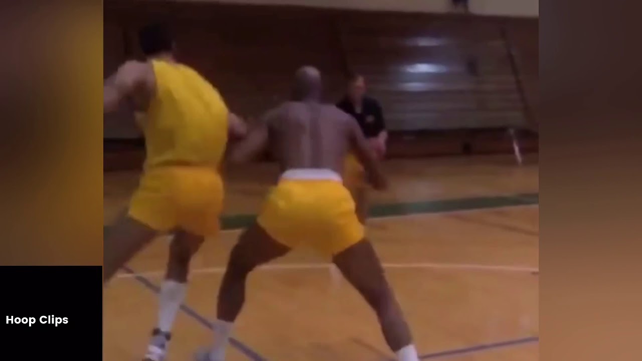 Kareem Abdul-Jabbar and Vlade Divac working on their game together (Rare)