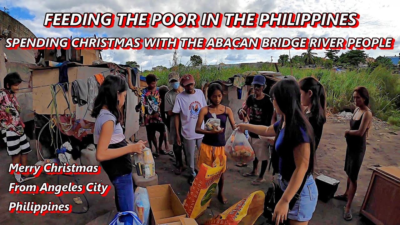 FEEDING THE POOR IN THE PHILIPPINES - SPENDING CHRISTMAS WITH THE ABACAN BRIDGE RIVER PEOPLE