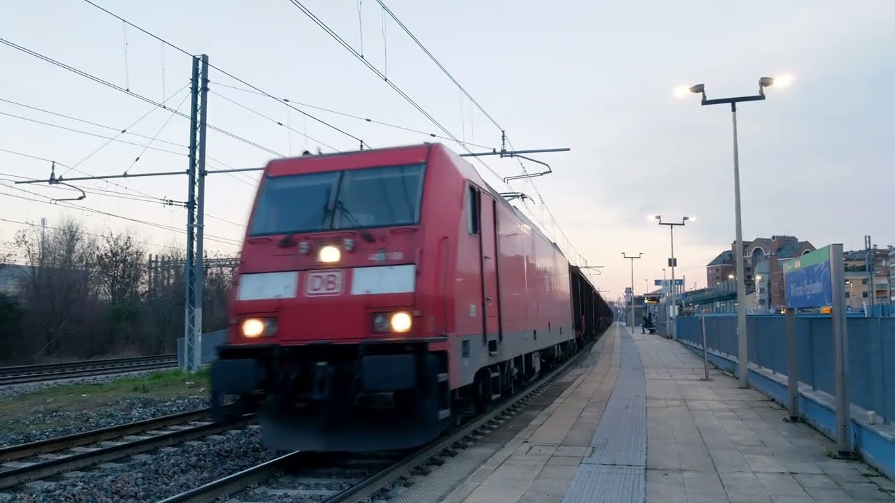 Freight train hauled by DB Cargo's E483 108, high sided wagons, Milan Forlanini, February 2026
