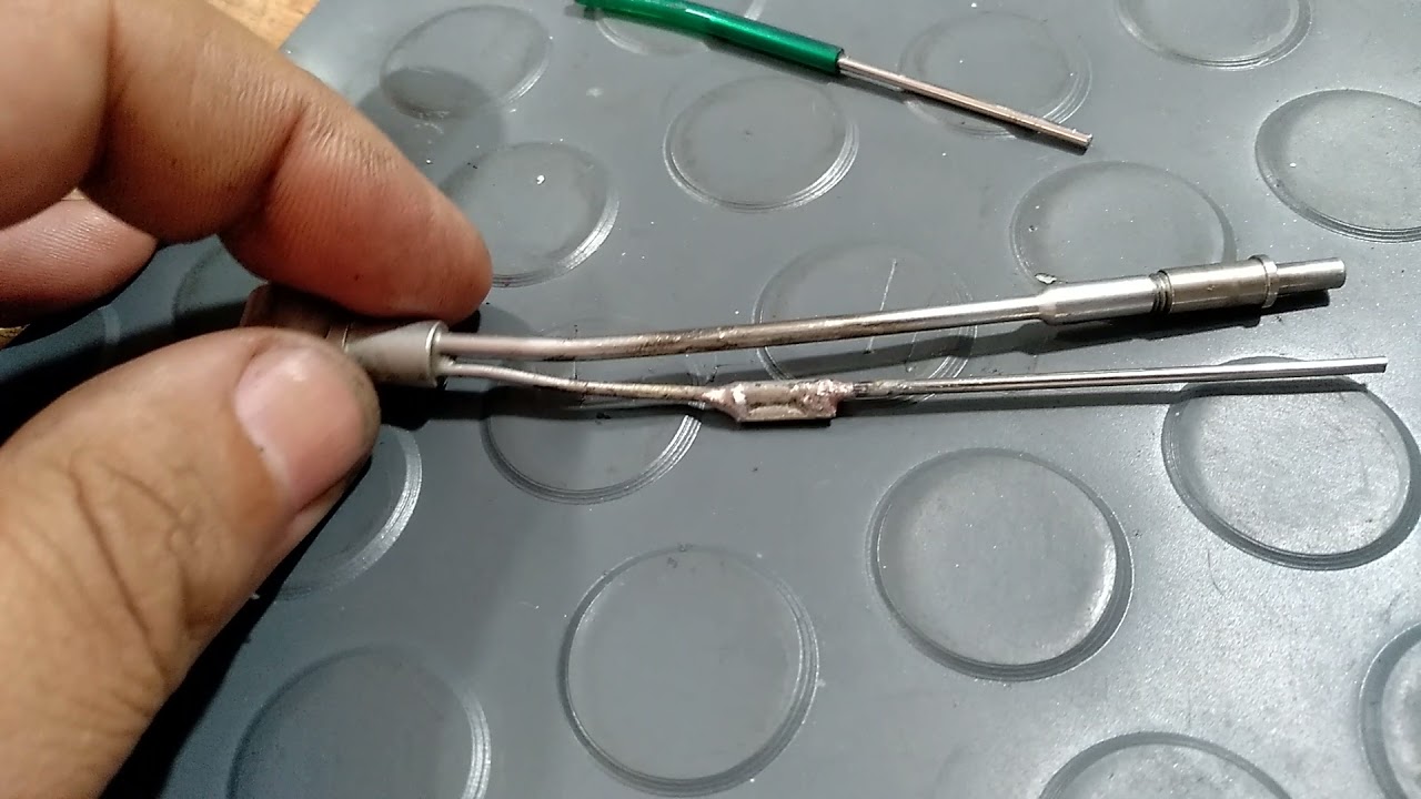 demonstração de reparo da tubulação de spray de uma caneta de alta rotação dabi atlante.