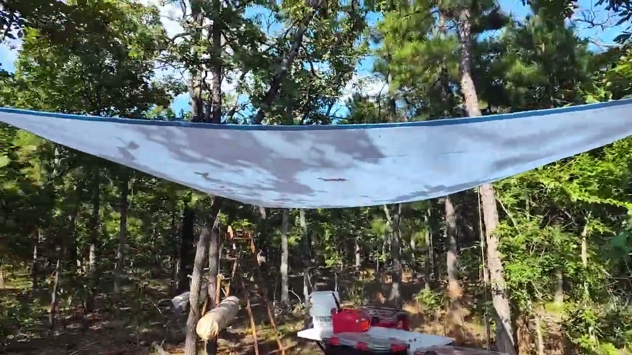 Bouncy sun shade using pulleys and weights