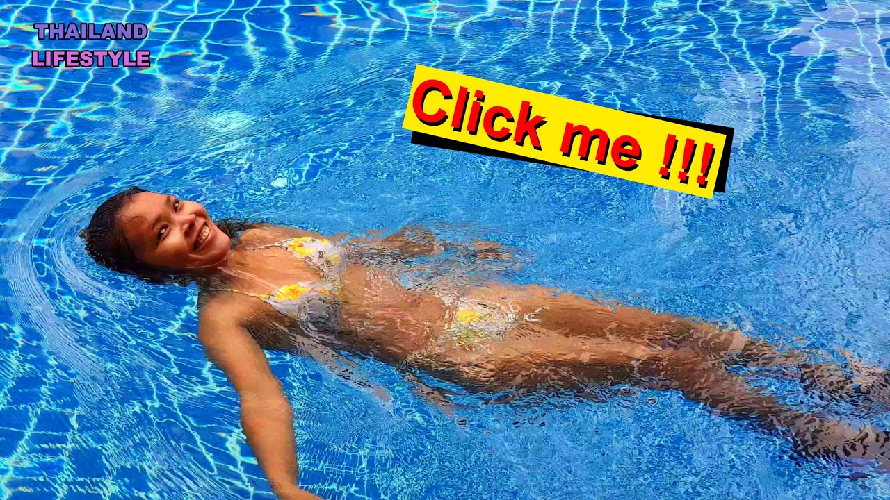 Thai bikini girl learning how to swim, Bangkok Thailand