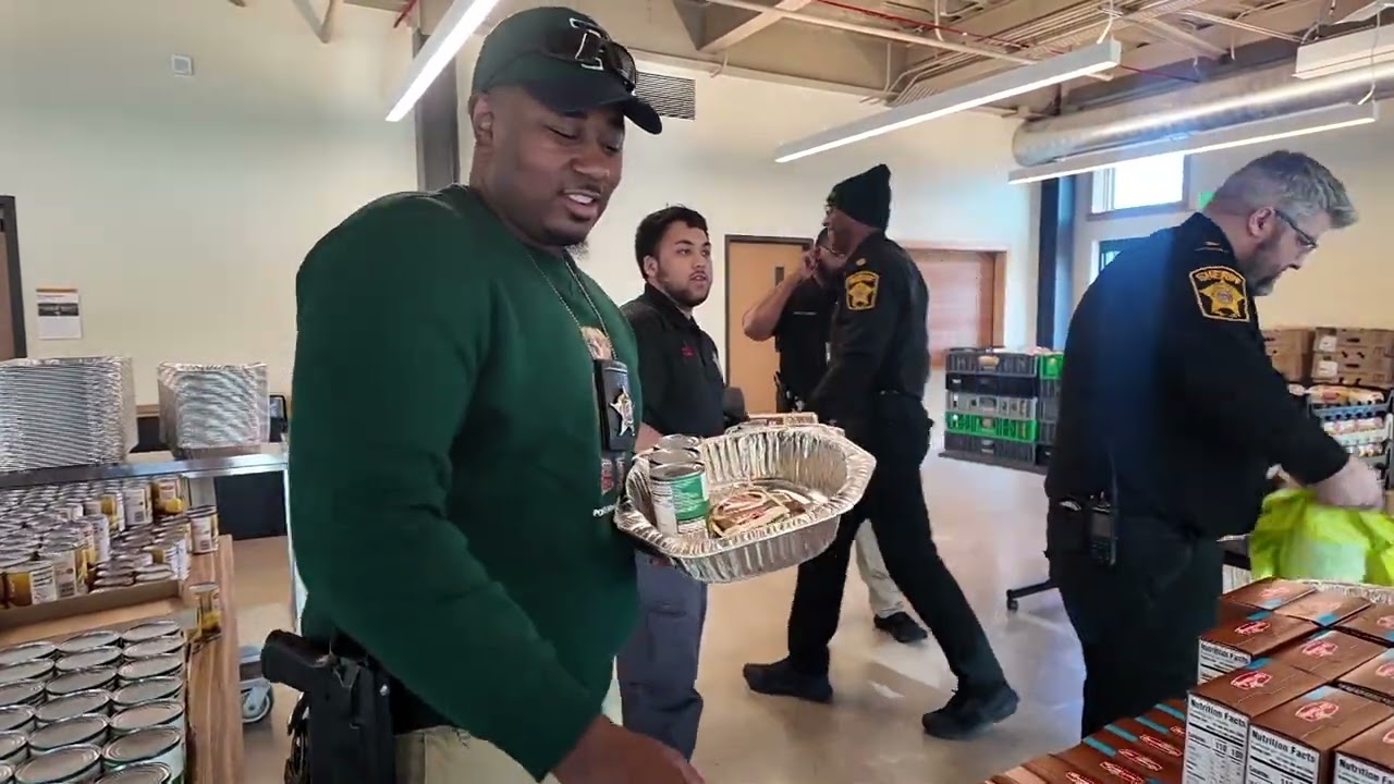 Milwaukee sheriff's deputies pack 150 Thanksgiving meal kits for families in need