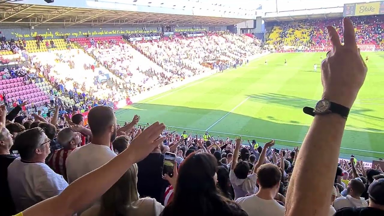 Pontus Jansson's Magic Hat. Brentford fans celebrate the winner at Watford.