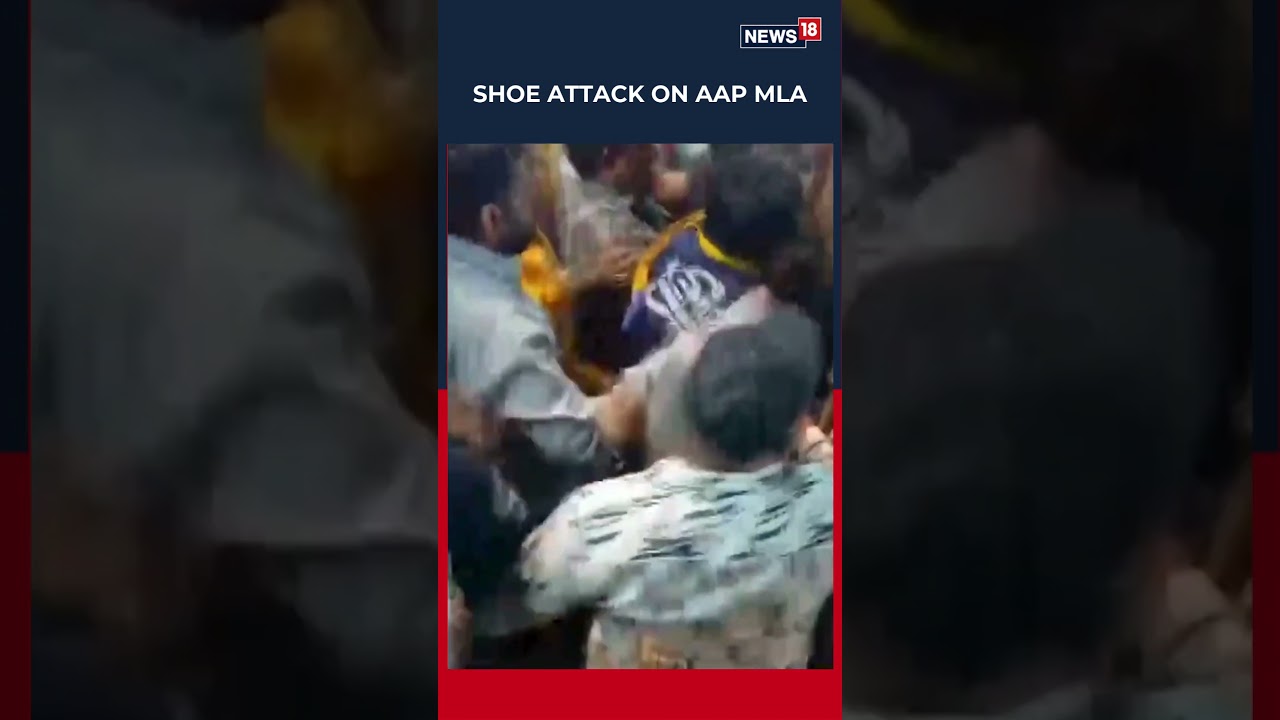 High Voltage Drama In AAP Rally: Man Throws Shoe At MLA Gopal Italia, Gets Beaten Up | N18S