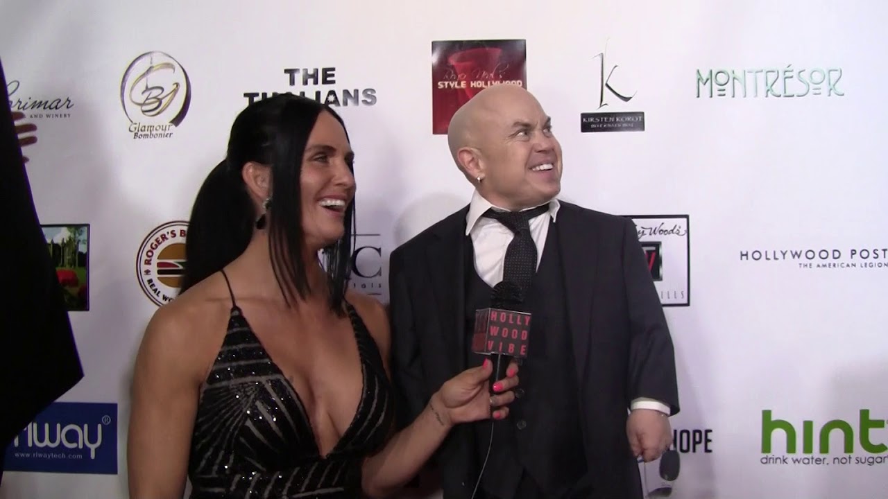 Traci Lynn Cowan with Martin Klebba at Roger Neal's Style Hollywood Party.