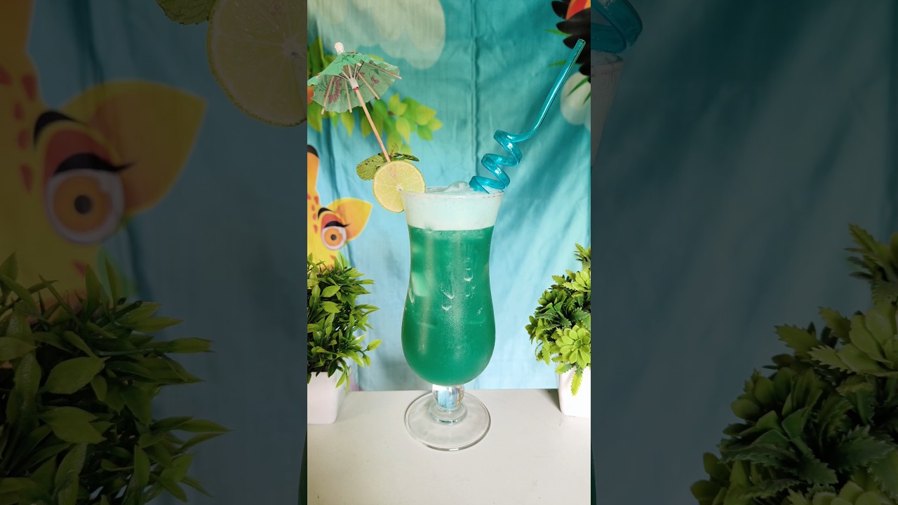 Blue Hawaiian Mocktail :- Pineapple Juice + Coconut Syrup + Blue Curacao Syrup 