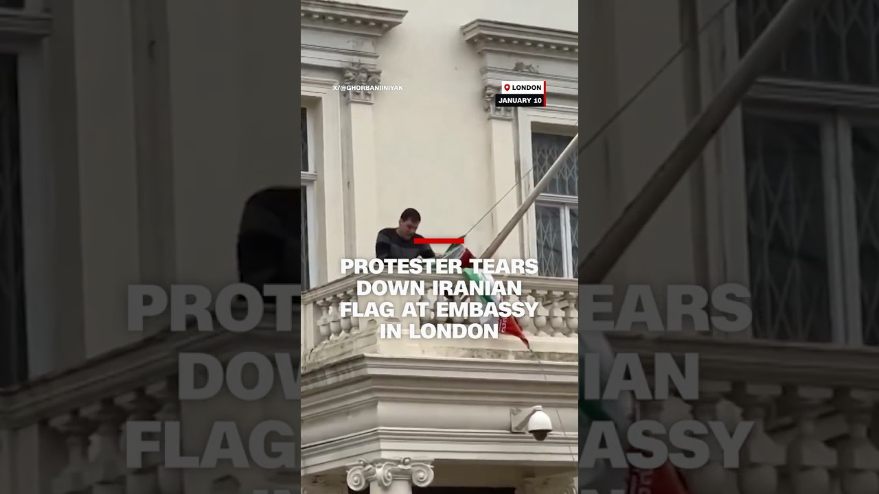 Protester&nbsp;tears down&nbsp;Iranian flag at&nbsp;embassy&nbsp;in London