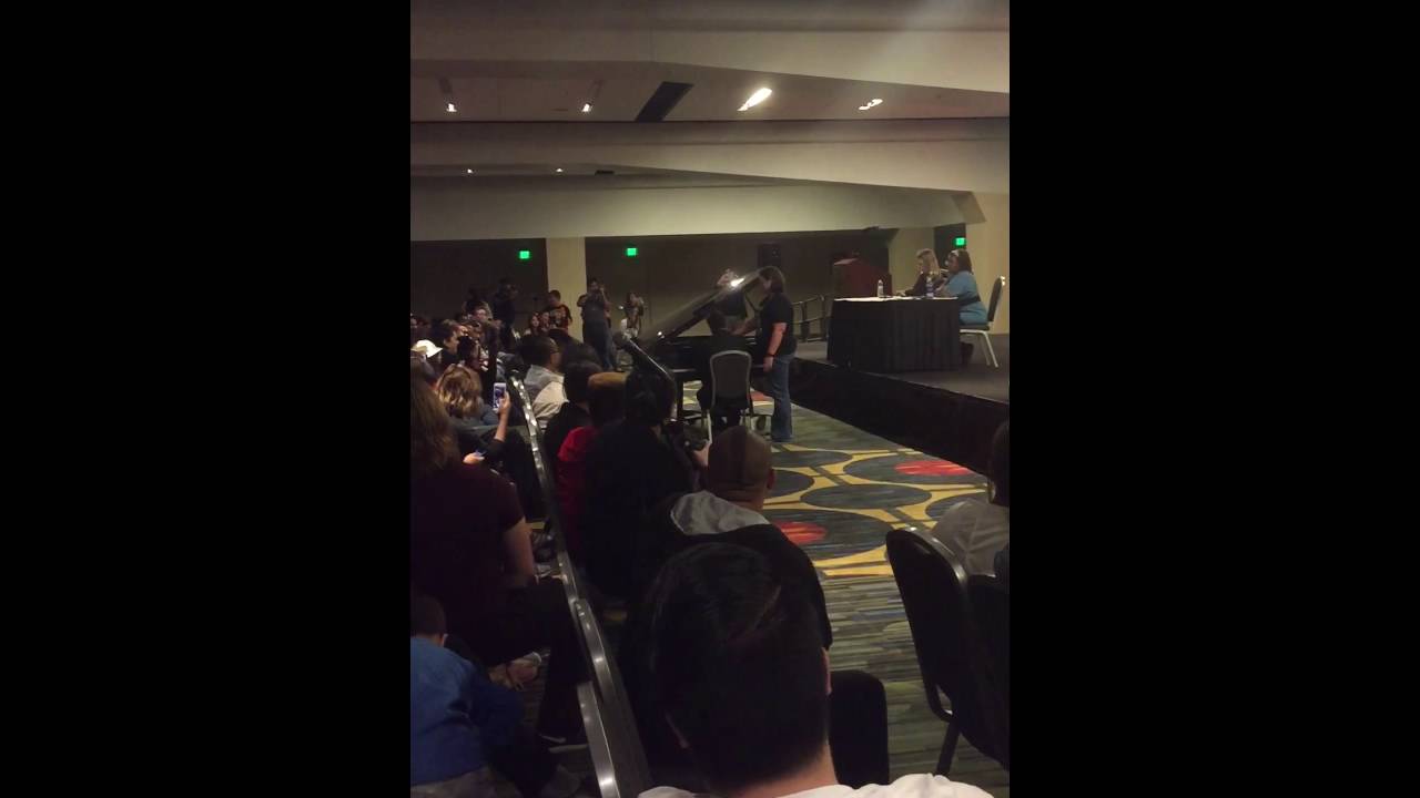 Manu Bennett playing and singing