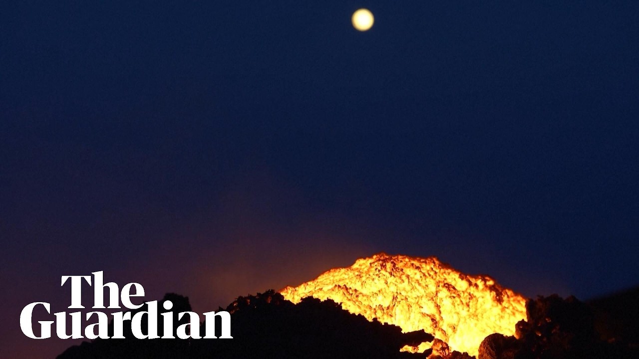 Mount Etna lava lights up Sicilian sky