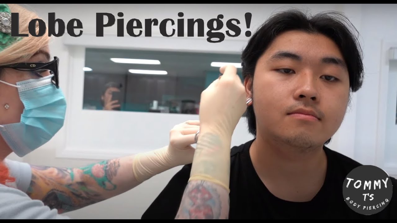 Logan gets his earlobes pierced at Tommy T's Body Piercing Huntington Beach, CA :)