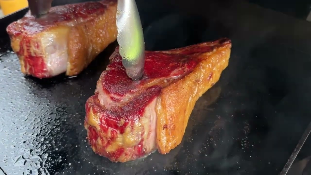 Weber table top Slate Griddle Tomahawks.