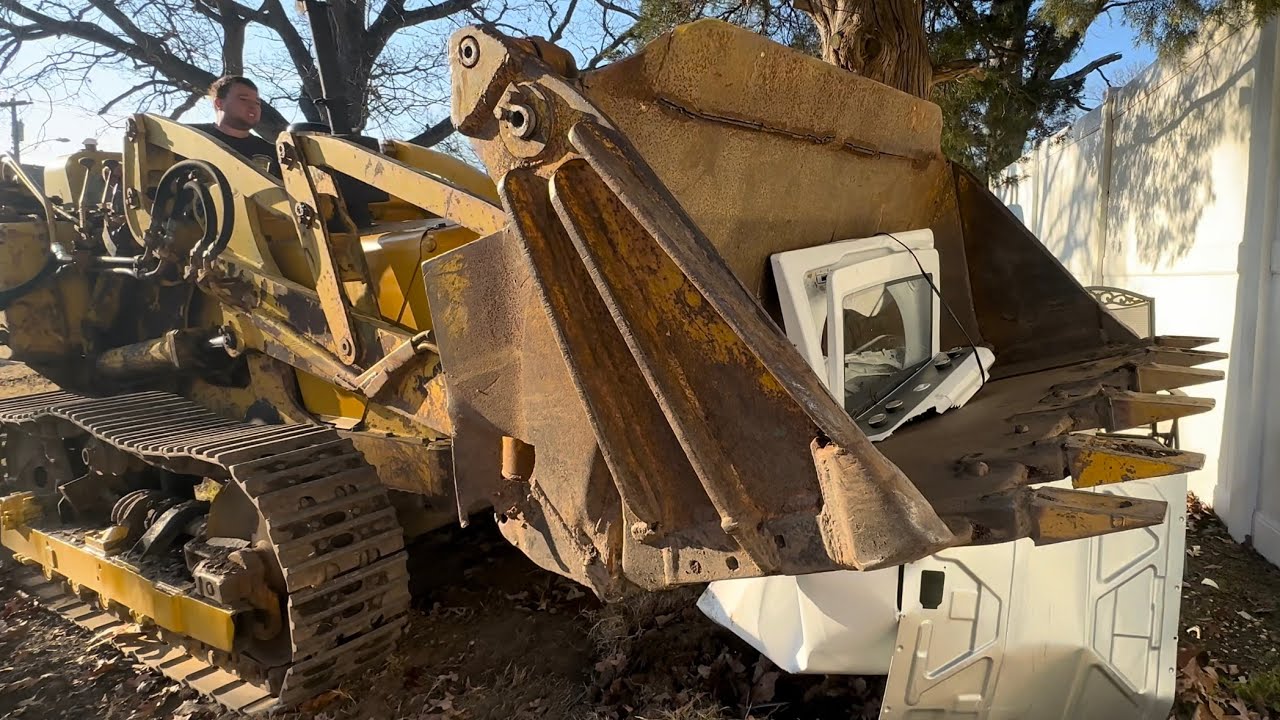 CRUSHING JUNK WITH A TRACK LOADER