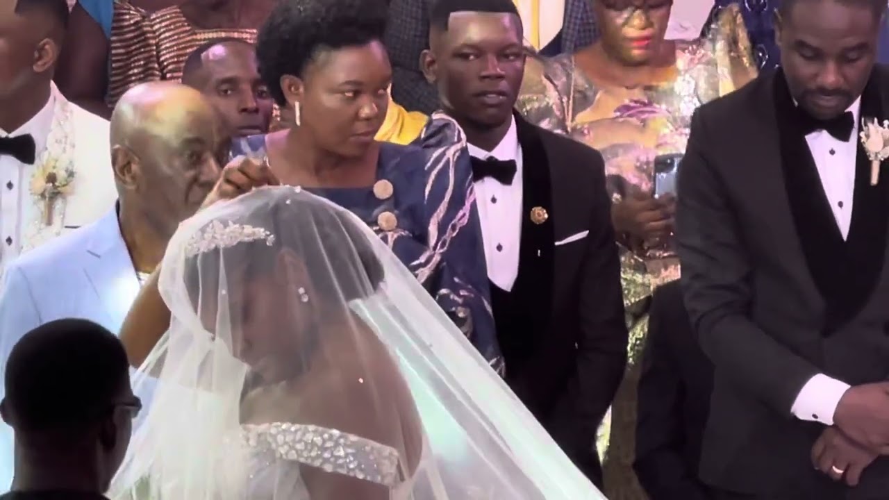 PR TOM MUGERWA ENTERED WITH HER DAUGHTER IN CHURCH