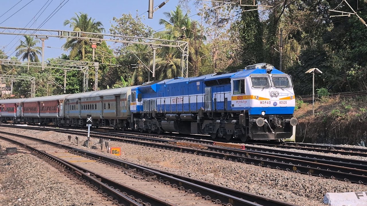 YPR MAJN Gomteshwara Express, hauled by a freshly painted WDP4D from KJM DLS, crawls towards MAJN