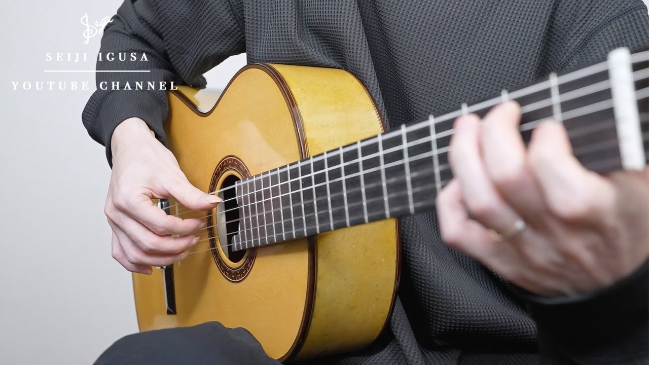 A handmade guitar made from paper.