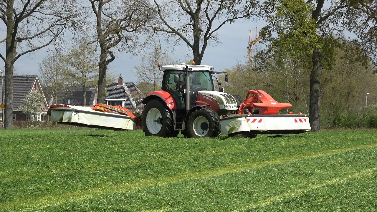 Gras maaien met Steyr 6125 Profi en Kuhn maaiers (2023)