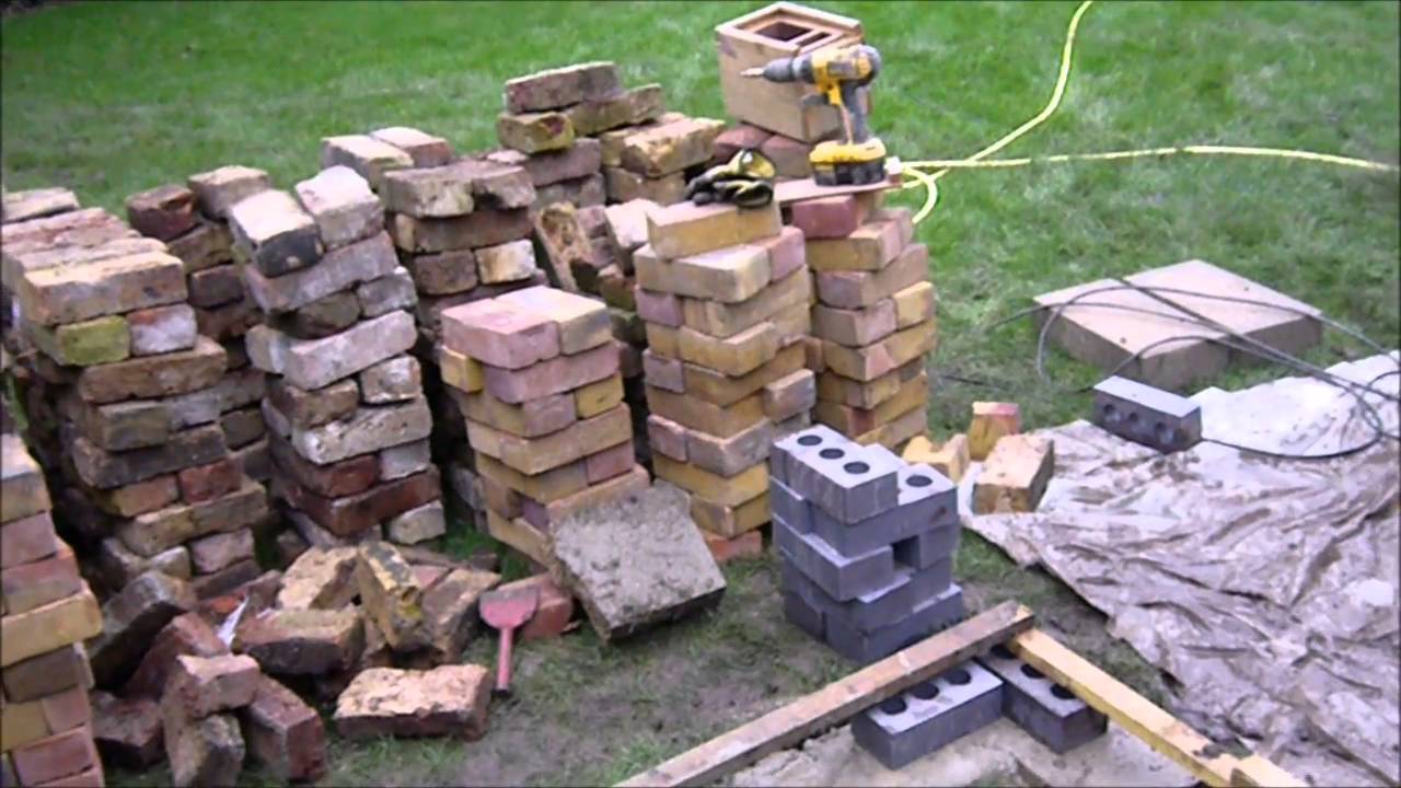 Building a new greenhouse base from salvaged bricks