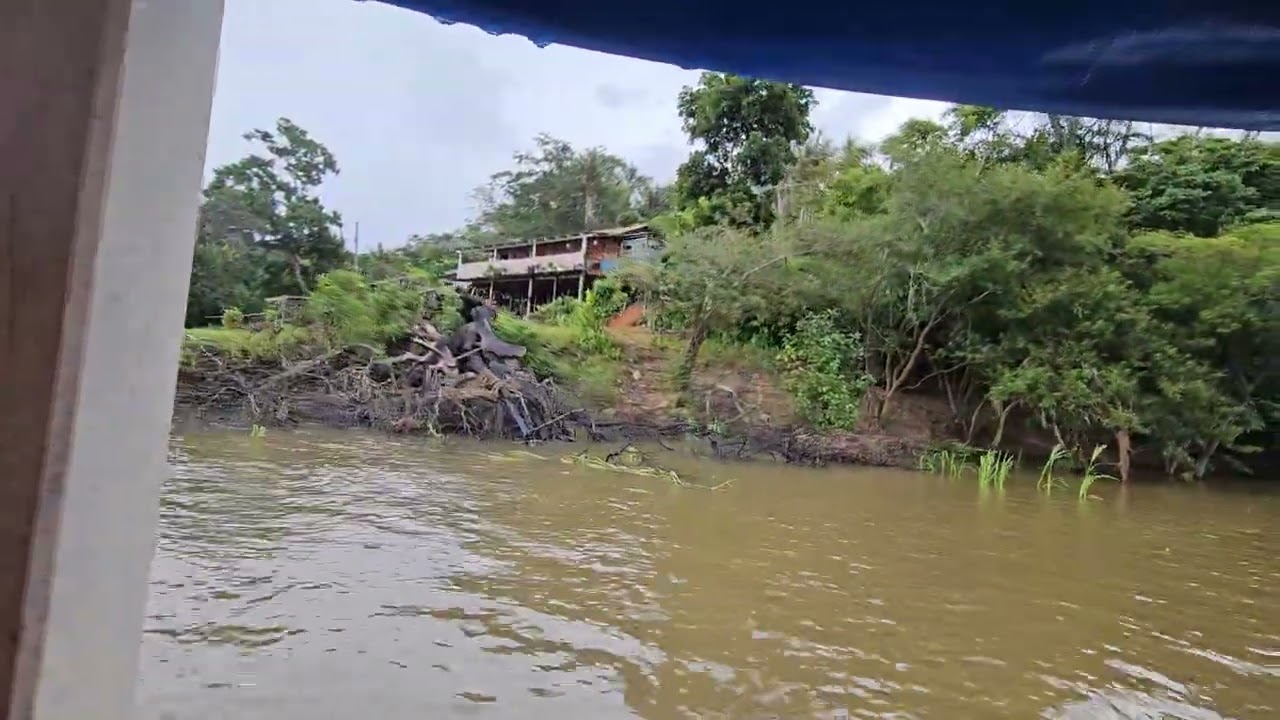 Rain started to clear going down the river in the Amazon of Brazil! Boca de Valeria 