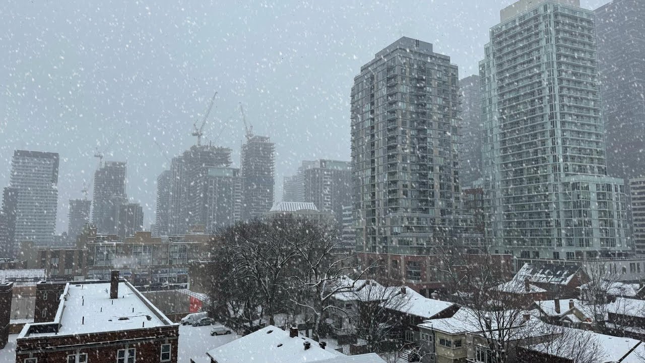 Toronto LIVE: Spring snowfall view from midtown stream