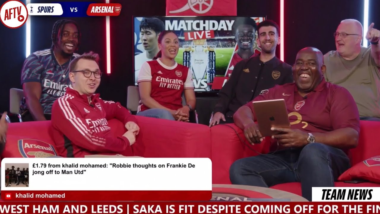 Don Robbie watches himself on TV