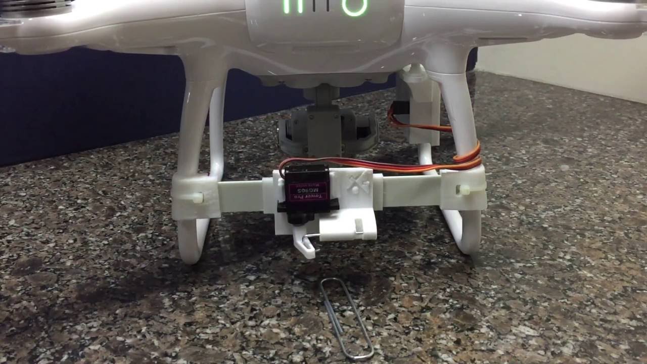 DJI Phantom 4 servo activated payload release mechanism controlled via DJI RC or via GO App.